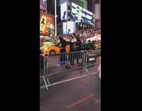 Darth Vader and Stormtrooper dance while riding a hoverboard and motorized skateboard in the middle of the street