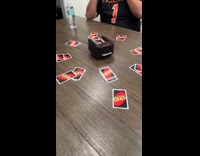 Uno cards on automatic shuffler dispenser