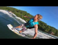Blue life jacket guy white wakeboard flip 