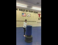 Guy kick bag then kick water bottle taekwondo