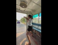 Barefoot Lady in Uniform Dances to Car Horn