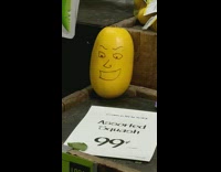 yellow squash with face marked on it