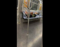 Man does ab workout on subway seats 