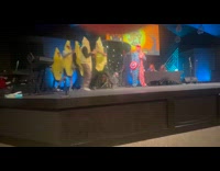 Guys wear banana costume at Halloween contest