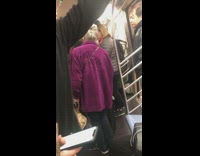 Old woman purple jacket yells to stay away from her on subway train