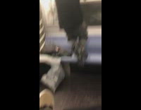 homeless man does pull ups on subway train