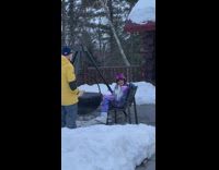 Woman reflective jacket raise foot fire pit