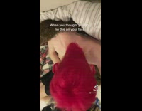 Shirtless guy red hair dye down back of neck