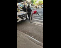 Cops watch old man push ups crosswalk