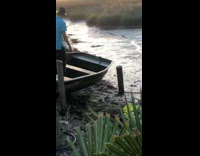 Two guys row boat fail blue shirt