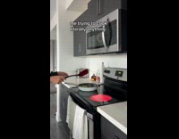 Girl cooking induction stove fire