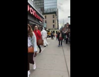 corona virus white hazmat suit CVS sidewalk