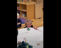 Toddler hits chin on edge of table 
