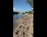 Topless Man Hits Ramp and Swims Away 