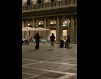 Collab IITW - Two women tiktok dance in the middle of the park at night blue light falls end