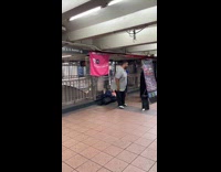 Man sings opera songs at subway station