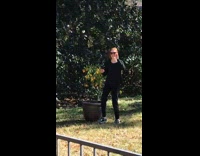 Girl takes selfie with lemon tree