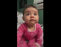 Baby smiles when mom asked to take pictures