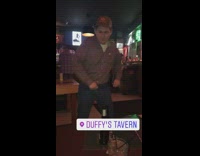 Drunk guy dances to edm music at a bar called Duffy Tavern