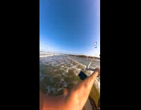 Filmer beach kitesurf and performs trick mid-air Part 2