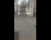 Collab IITW - Photoshoot on side walk straw bag red boots