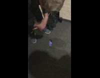 Guy tries to put out fire shot 