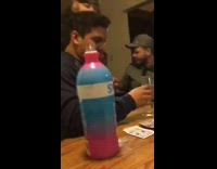 Guy drinks tall shot of Svedka vodka