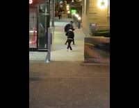 Man in black leather jacket robotic dance