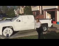 girl striped shirt washing truck falls down