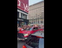 People side of street films city sunset