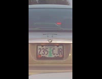 Guy laugh at tiny spoiler of car