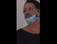 Mom with beard wears face mask 