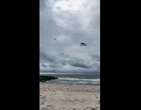 Collab WINY - Plane with Philharmonics JAWS concert banner advertisement