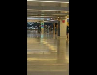 Group of people dances together on the train station
