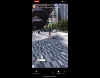 girl puts phone on stick for picture