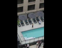 Woman white skirt lean on glass railings