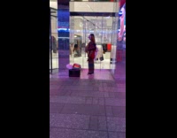 Sweaty clown workout outside clothes store night