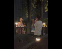 Collab IITW - Woman shiny pink dress poses with food