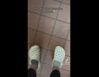 Girl screams and scares guy in blue apron 