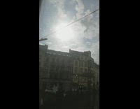 Person film rain while sun is out