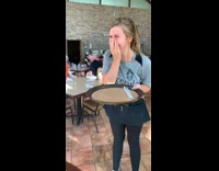 Waitress spins drops drinks from tray