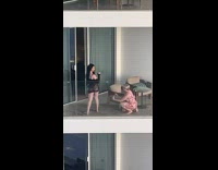 Mom squats to get photo of daughter at hotel room 
