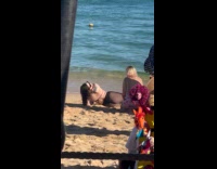 Woman in bikini with tights beach photoshoot