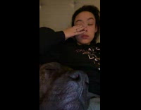 Black dog sleeping snoring loudly 