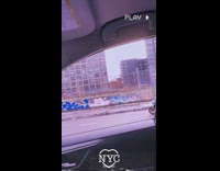 Man rides motorcycle with red balloons behind