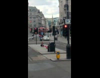 Pink leggings girl exercises center median street