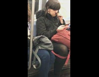 Woman smells and chews her hair on subway train