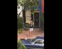 Girl plant vase over head watch car