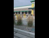 Boy Repeatedly Kicks Yellow Pole 