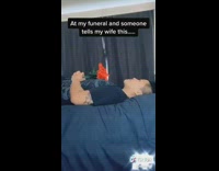 Blue shirt girl red flowers funeral casket 